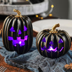 FESTGLOX 2Pcs Light Up Black Pumpkins for Halloween with Gold Lines, Small Jack O Lantern Pumpkins with Purple LED Light, Resin Halloween Pumpkin for Indoor Spooky Decor, Table (Battery Operated)